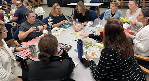 A Design Team meeting to discuss their entry point for redesign